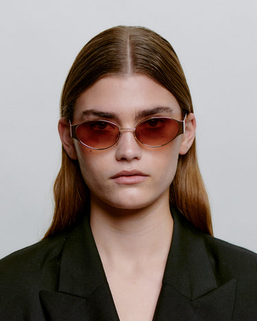 Lysebrun metal A.Kjærbede solbriller, med hængsler på dame